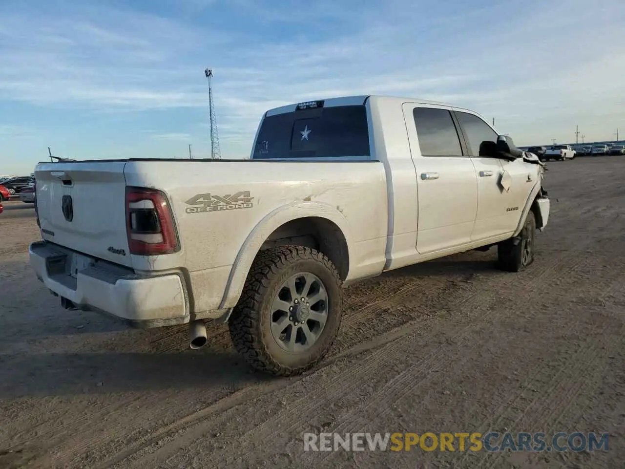 3 fotografías del automóvil dañado 3C6UR5NL0KG664229 RAM 2500 2019