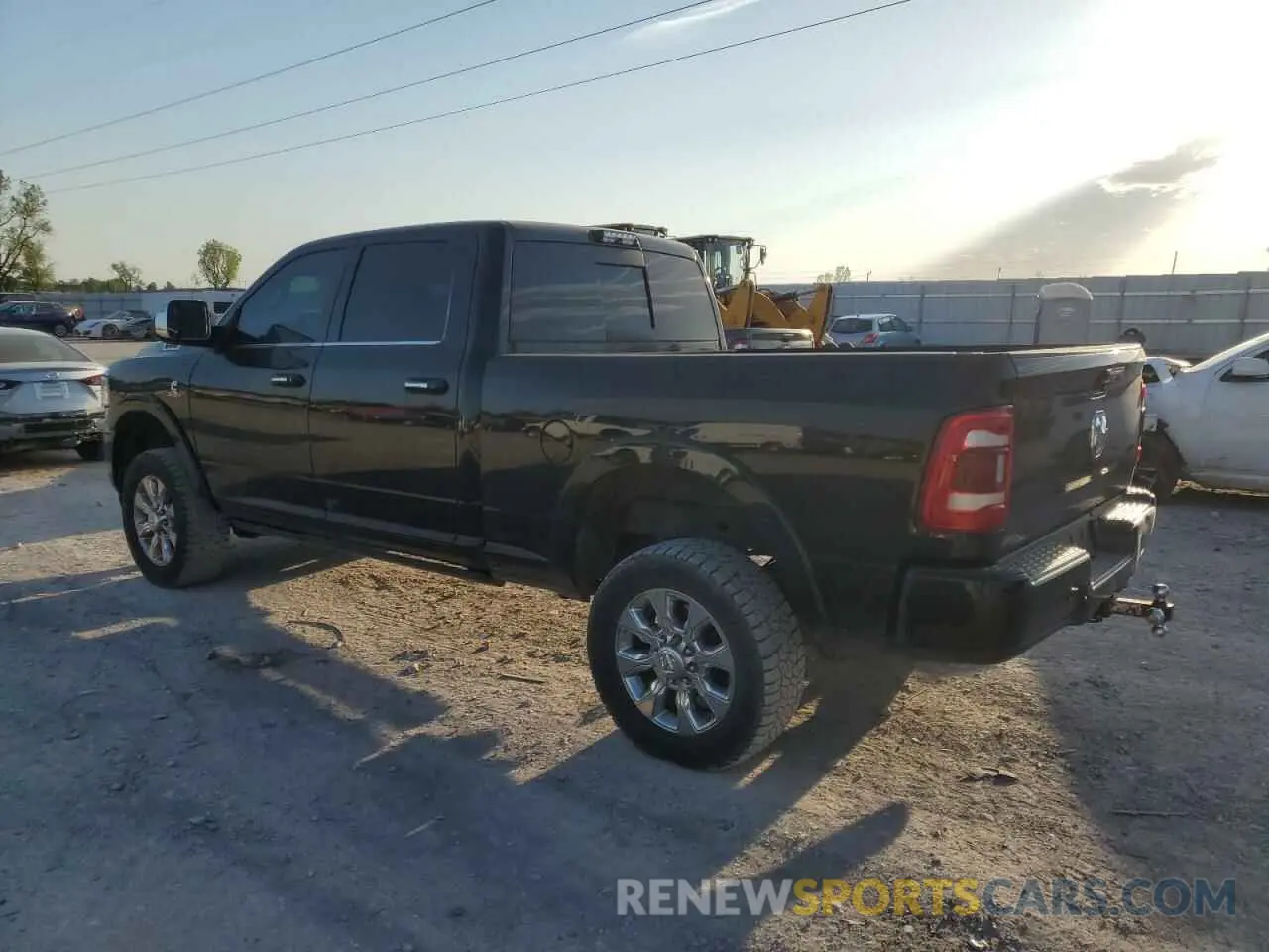 2 fotografías del automóvil dañado 3C6UR5SL2KG633908 RAM 2500 2019