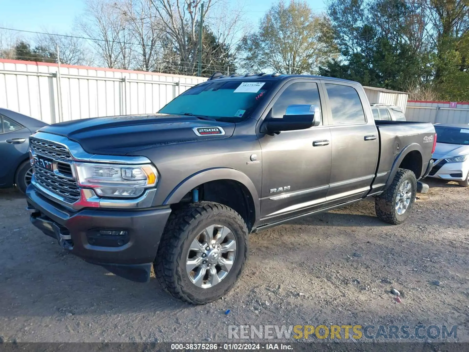 2 fotografías del automóvil dañado 3C6UR5SL3KG615465 RAM 2500 2019