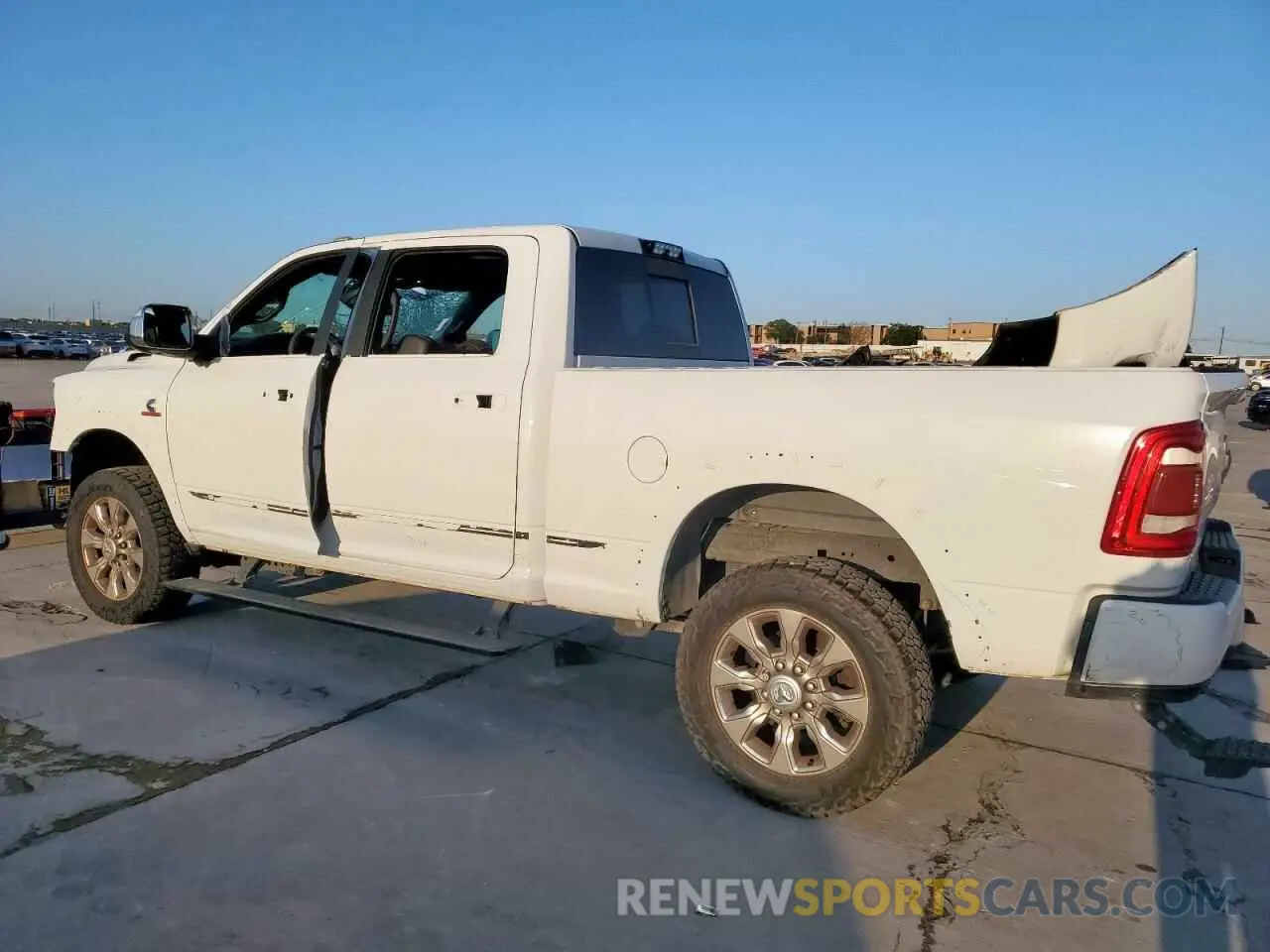 2 fotografías del automóvil dañado 3C6UR5SL9KG656991 RAM 2500 2019
