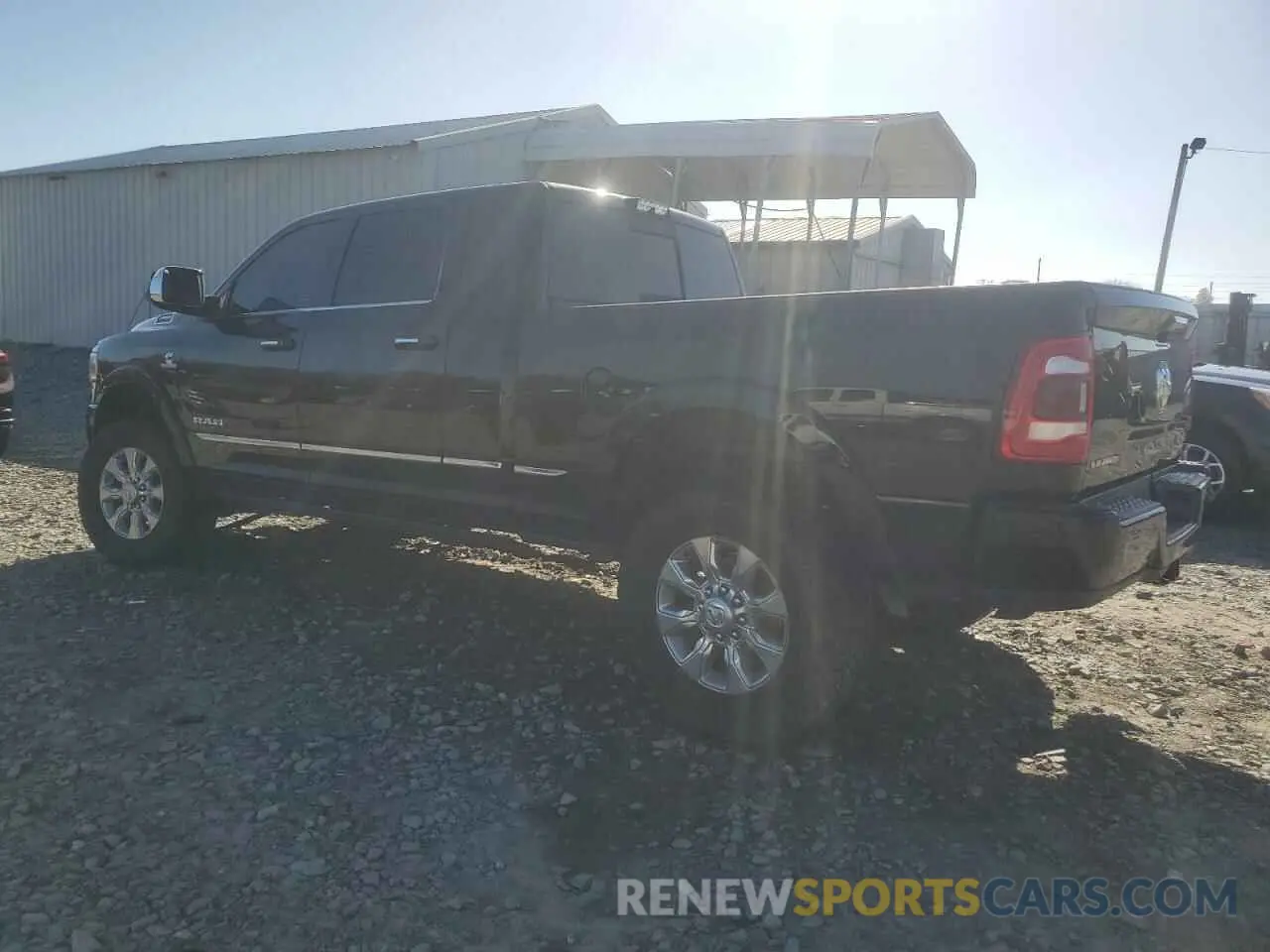 2 fotografías del automóvil dañado 3C6UR5TL5KG540024 RAM 2500 2019