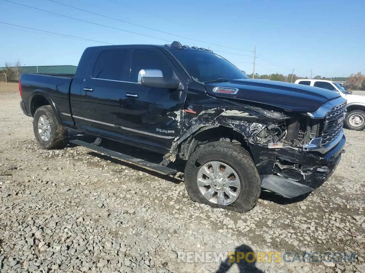 4 fotografías del automóvil dañado 3C6UR5TL5KG540024 RAM 2500 2019
