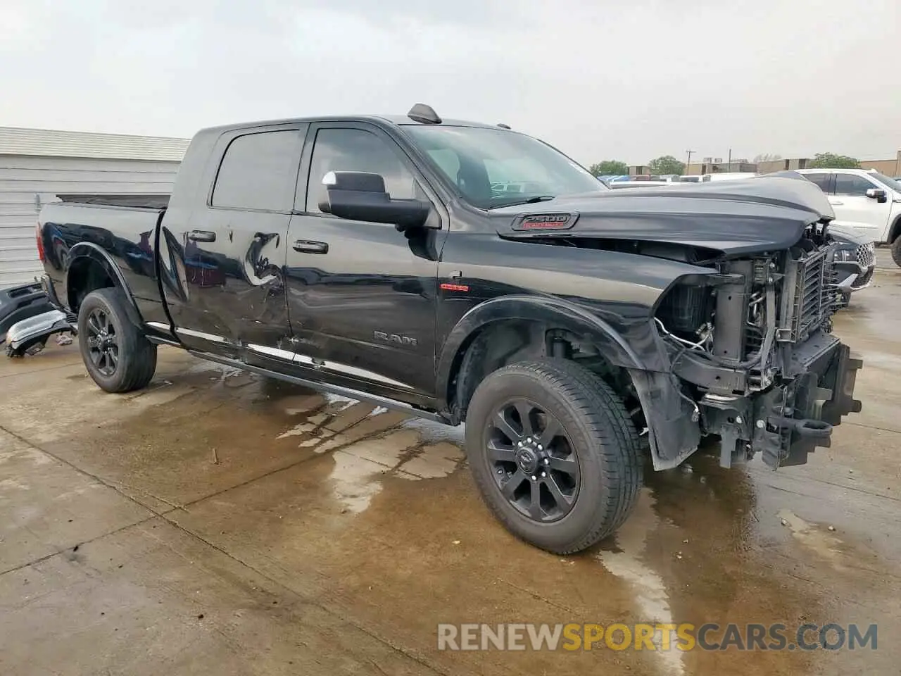 4 fotografías del automóvil dañado 3C6UR5NL1LG283474 RAM 2500 2020