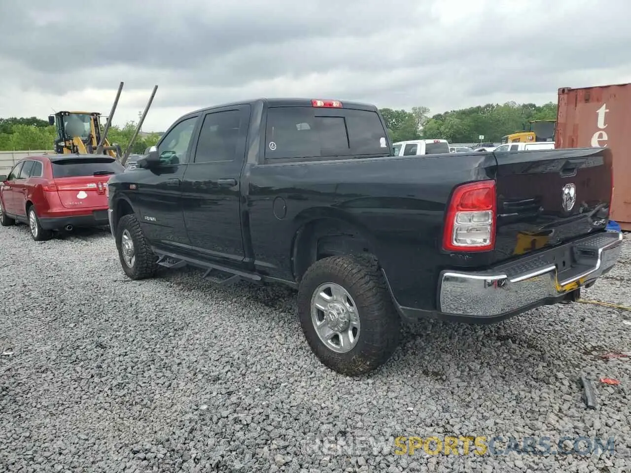 2 fotografías del automóvil dañado 3C6UR5CJ6MG695991 RAM 2500 2021