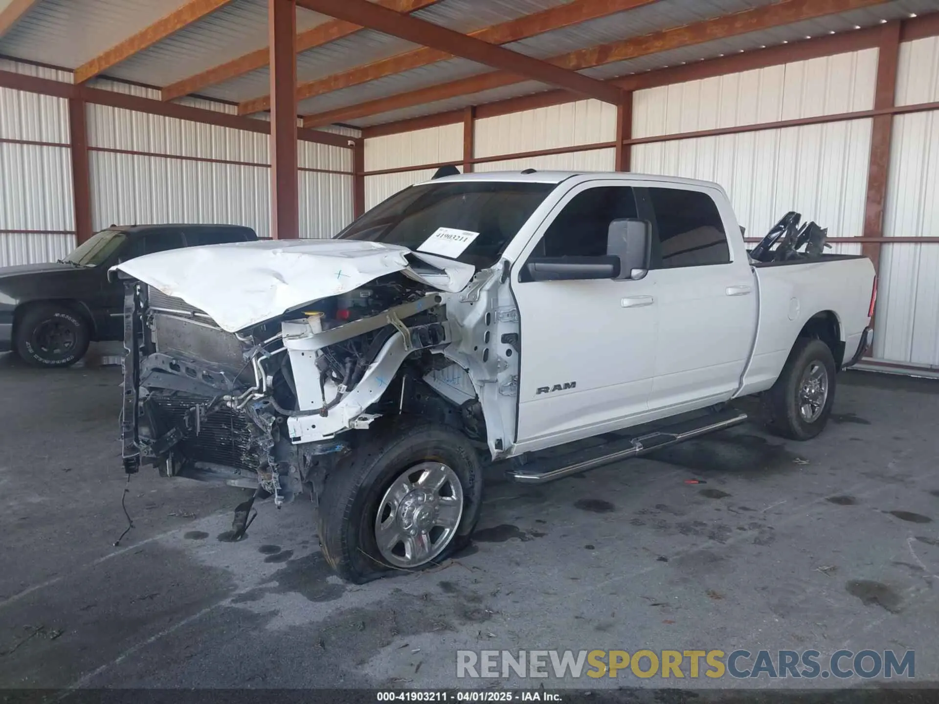2 fotografías del automóvil dañado 3C6UR5DL0MG653459 RAM 2500 2021
