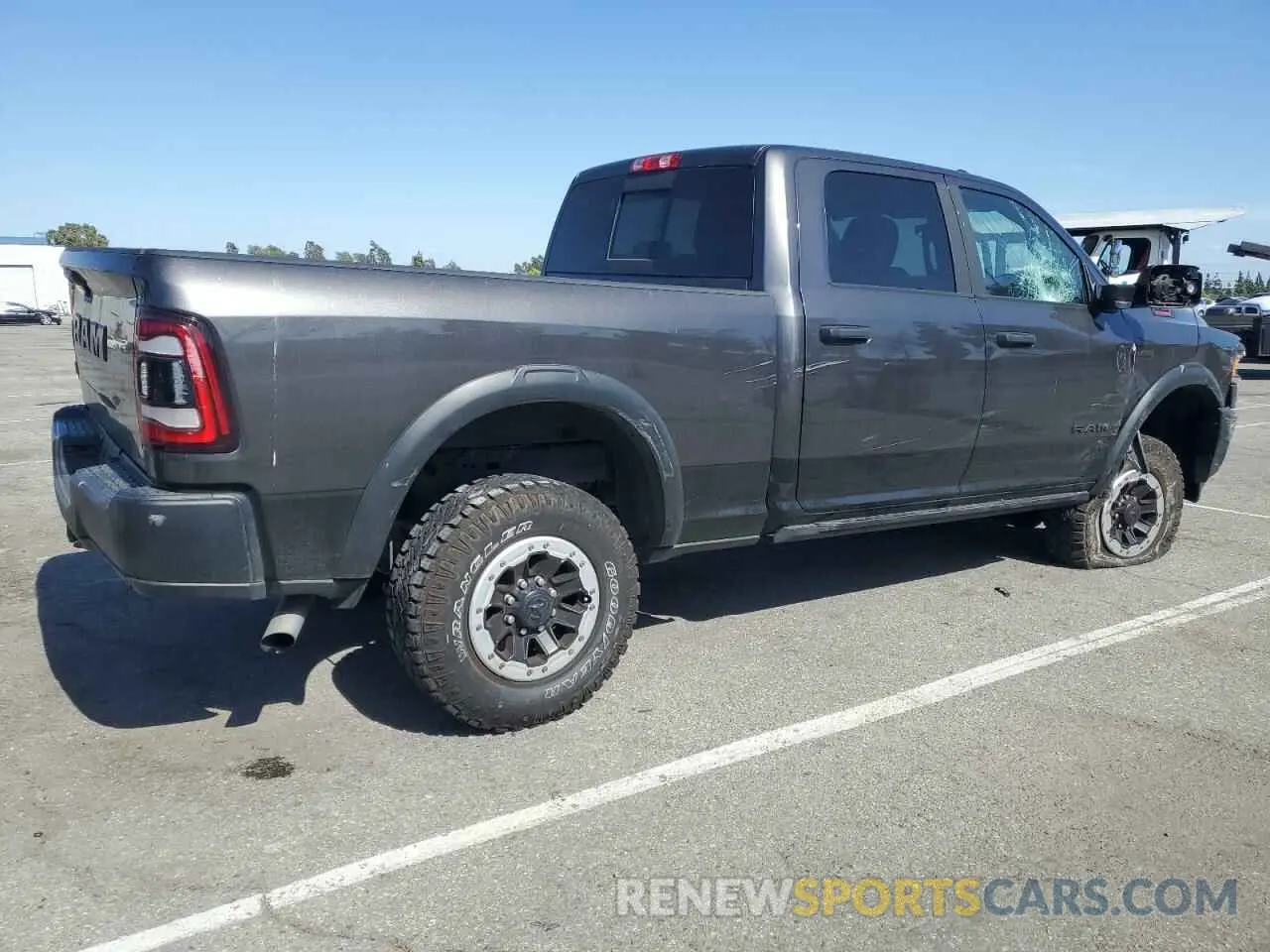 3 fotografías del automóvil dañado 3C6TR5EJ8NG384430 RAM 2500 2022