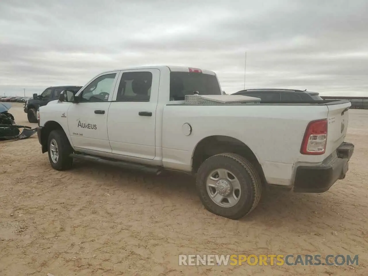 2 fotografías del automóvil dañado 3C6UR5CL6NG213524 RAM 2500 2022