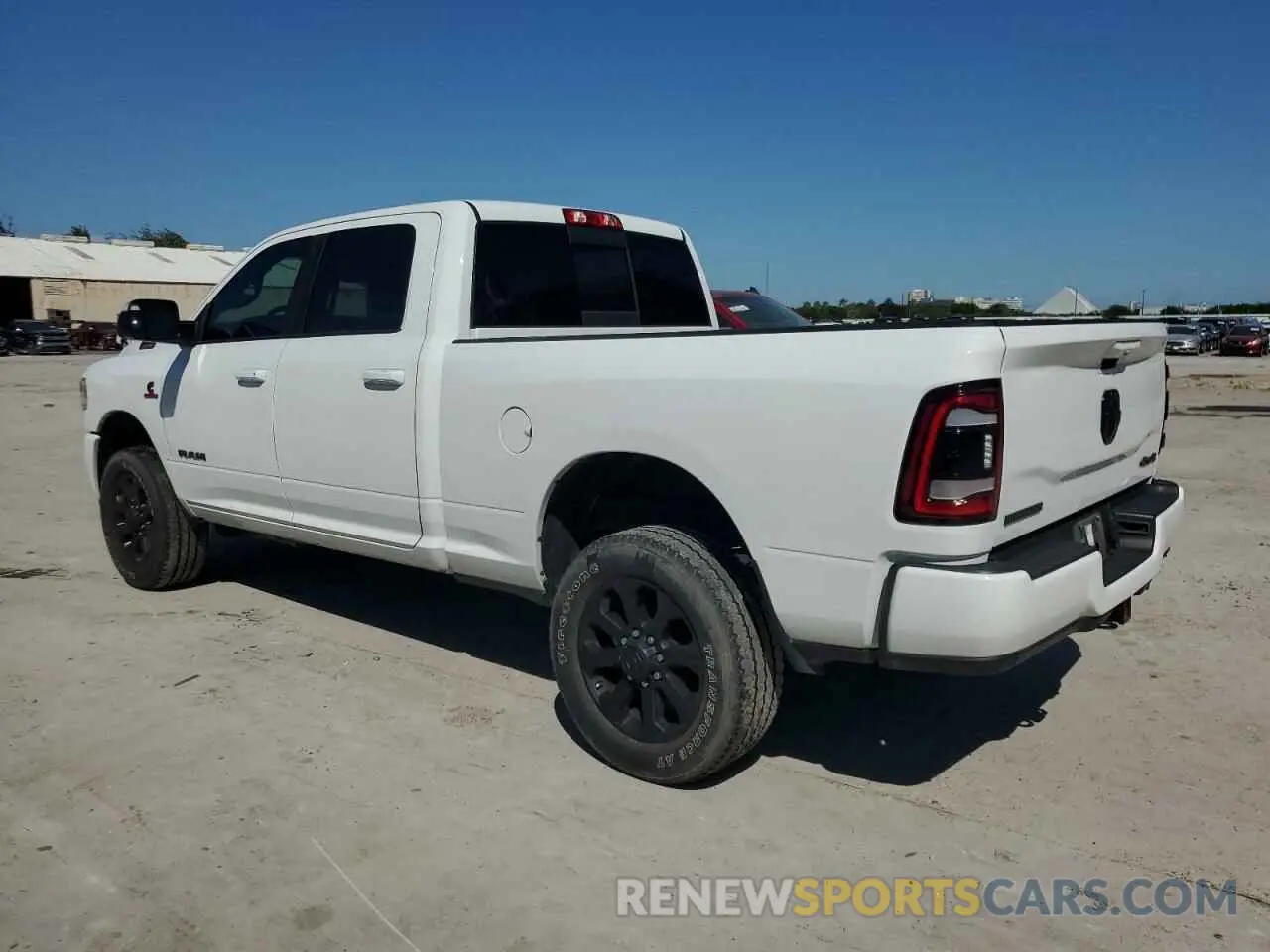 2 fotografías del automóvil dañado 3C6UR5DL7NG109526 RAM 2500 2022