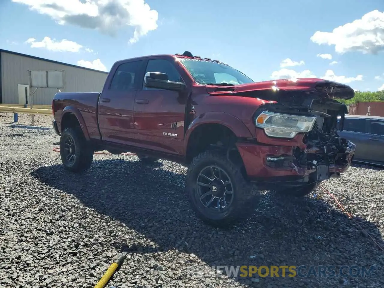 4 fotografías del automóvil dañado 3C6UR5DL9NG185880 RAM 2500 2022