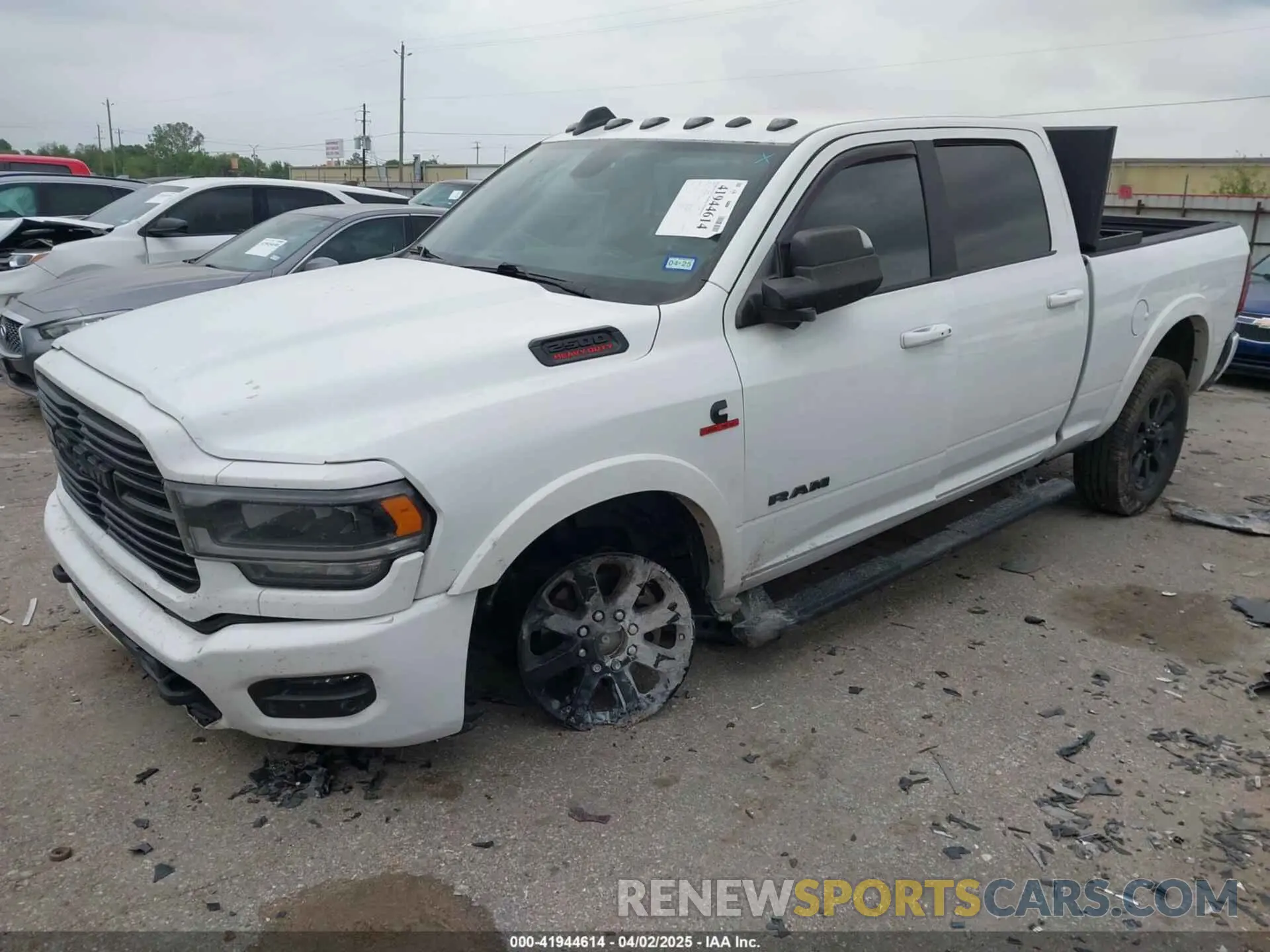 2 fotografías del automóvil dañado 3C6UR5FL4NG281929 RAM 2500 2022