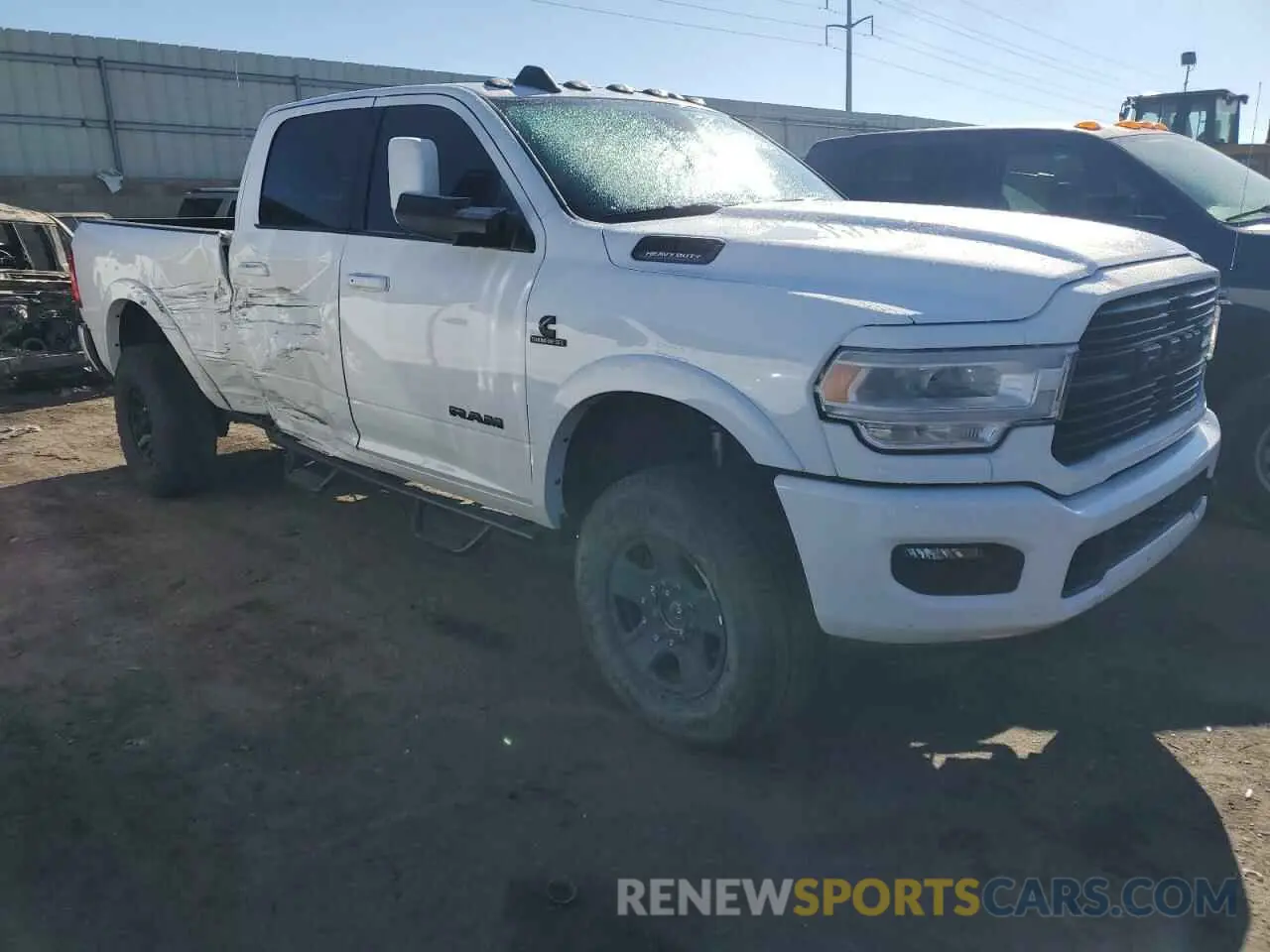 4 fotografías del automóvil dañado 3C6UR5FL7NG128025 RAM 2500 2022
