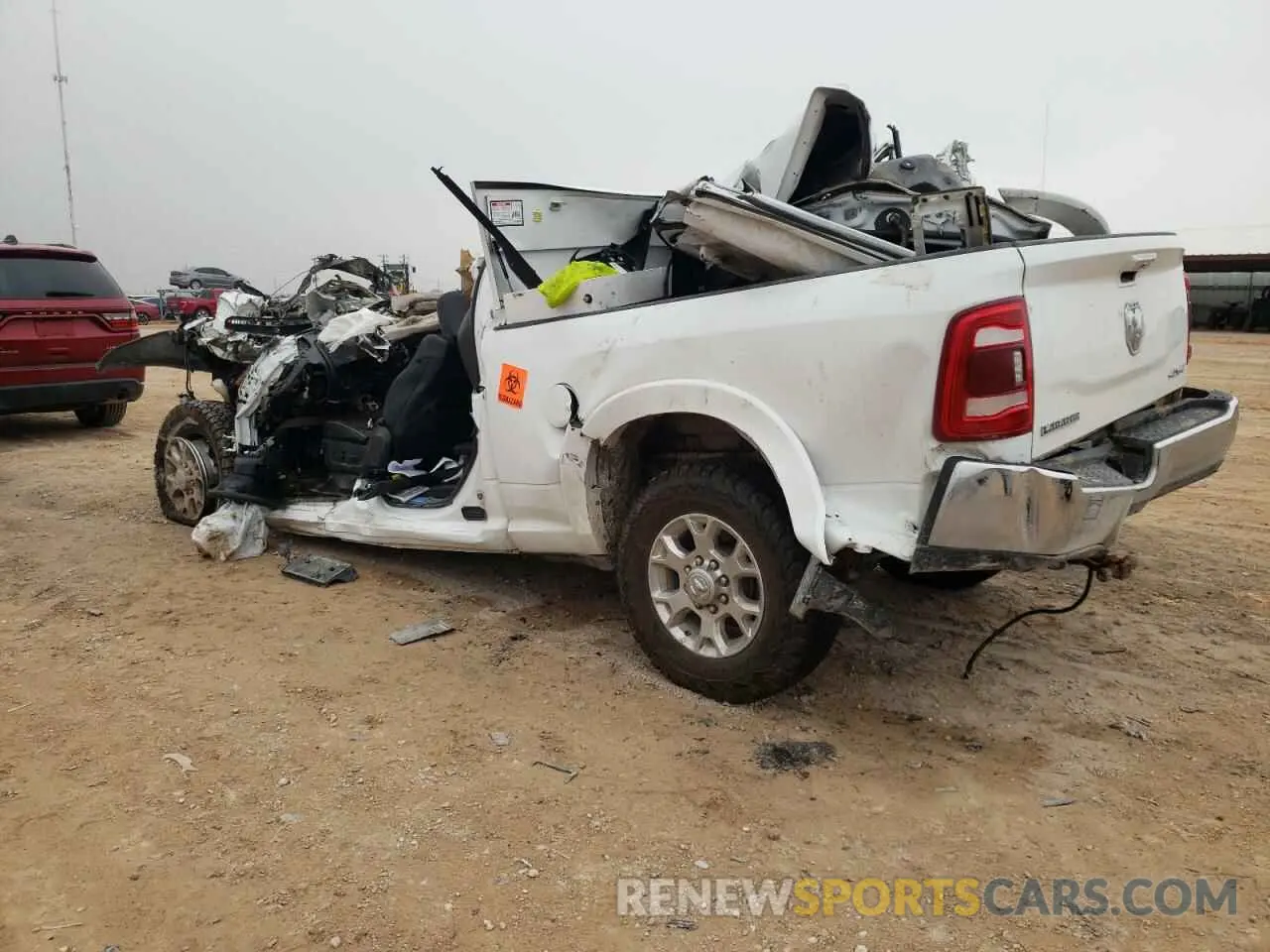 2 fotografías del automóvil dañado 3C6UR5FL8NG178755 RAM 2500 2022