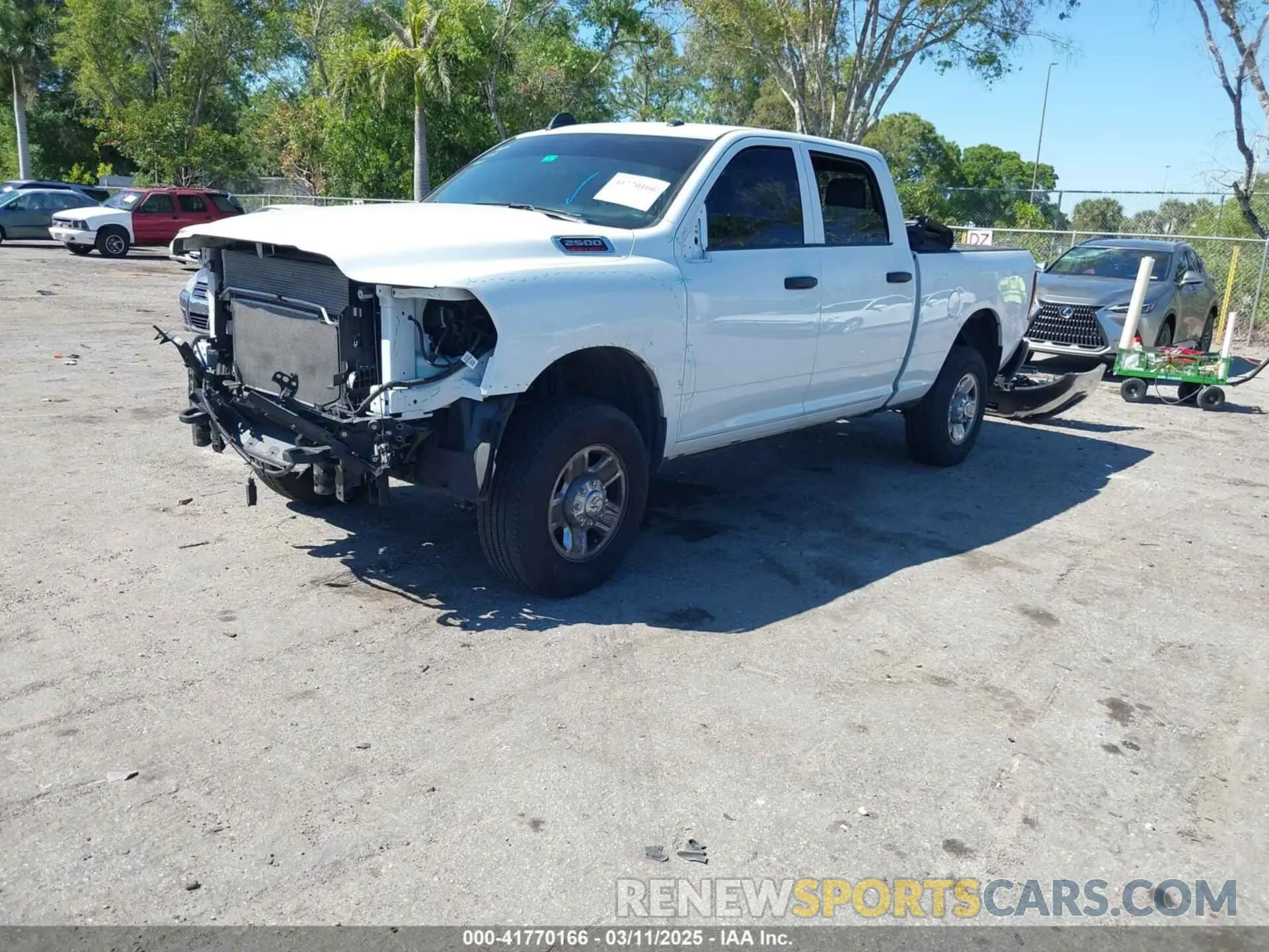 2 fotografías del automóvil dañado 3C6UR5CJ6PG517275 RAM 2500 2023