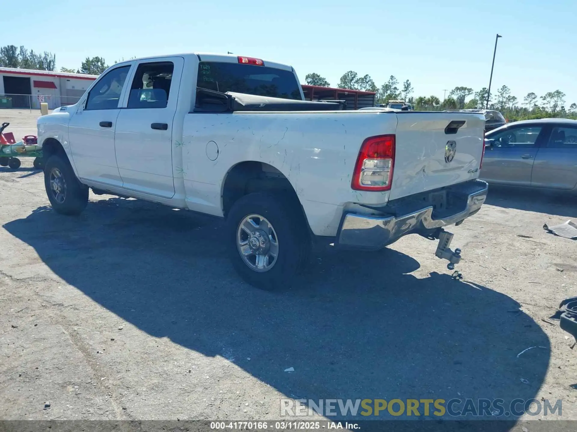 3 fotografías del automóvil dañado 3C6UR5CJ6PG517275 RAM 2500 2023
