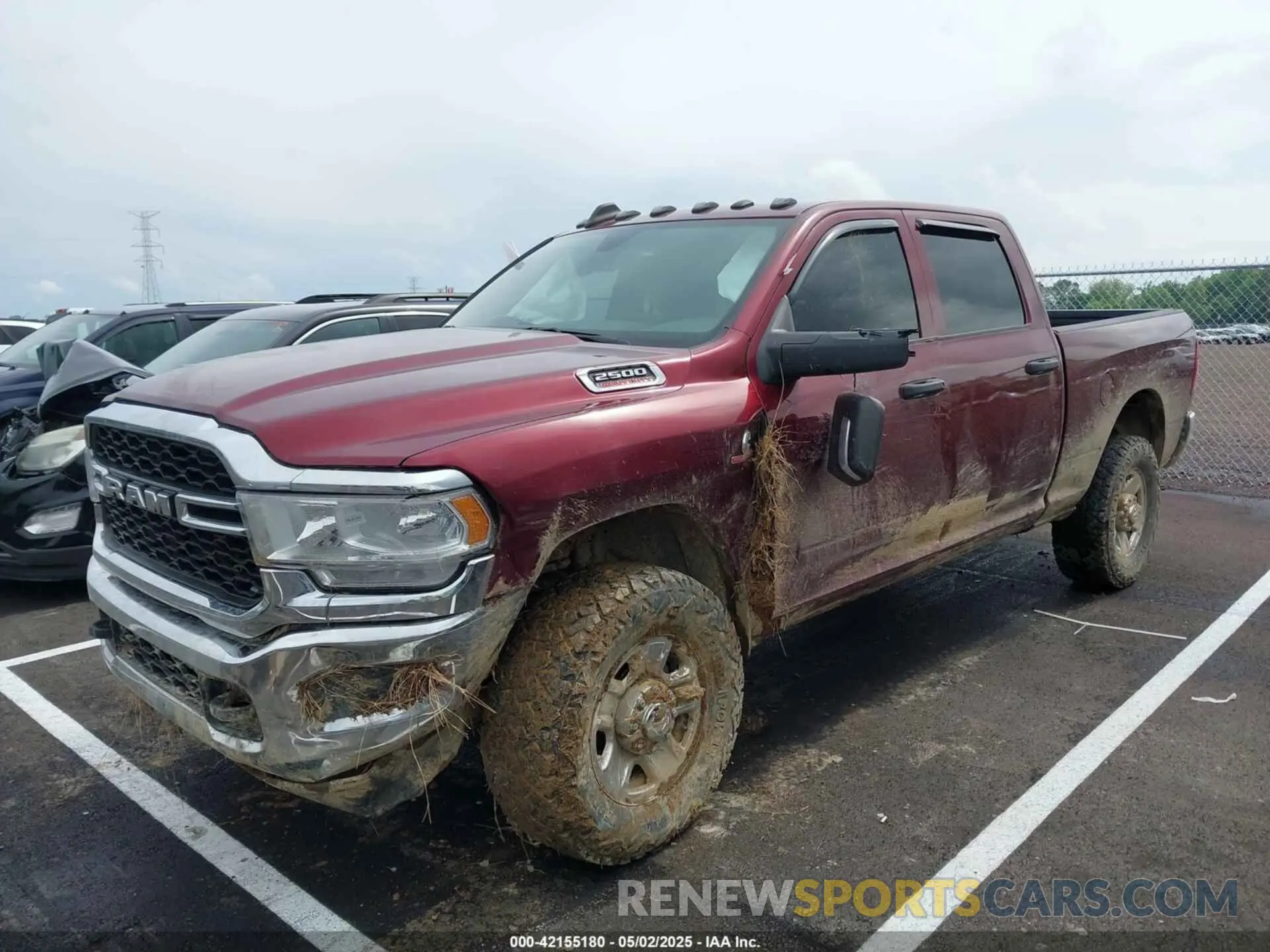 2 fotografías del automóvil dañado 3C6UR5CL3PG504534 RAM 2500 2023