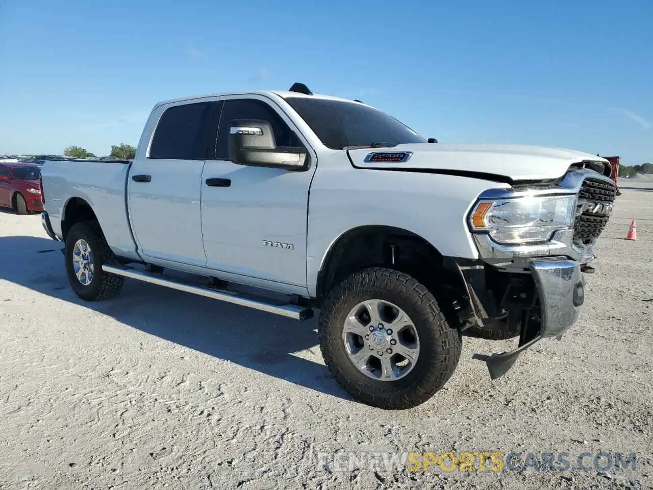4 fotografías del automóvil dañado 3C6UR5DJ9PG568512 RAM 2500 2023