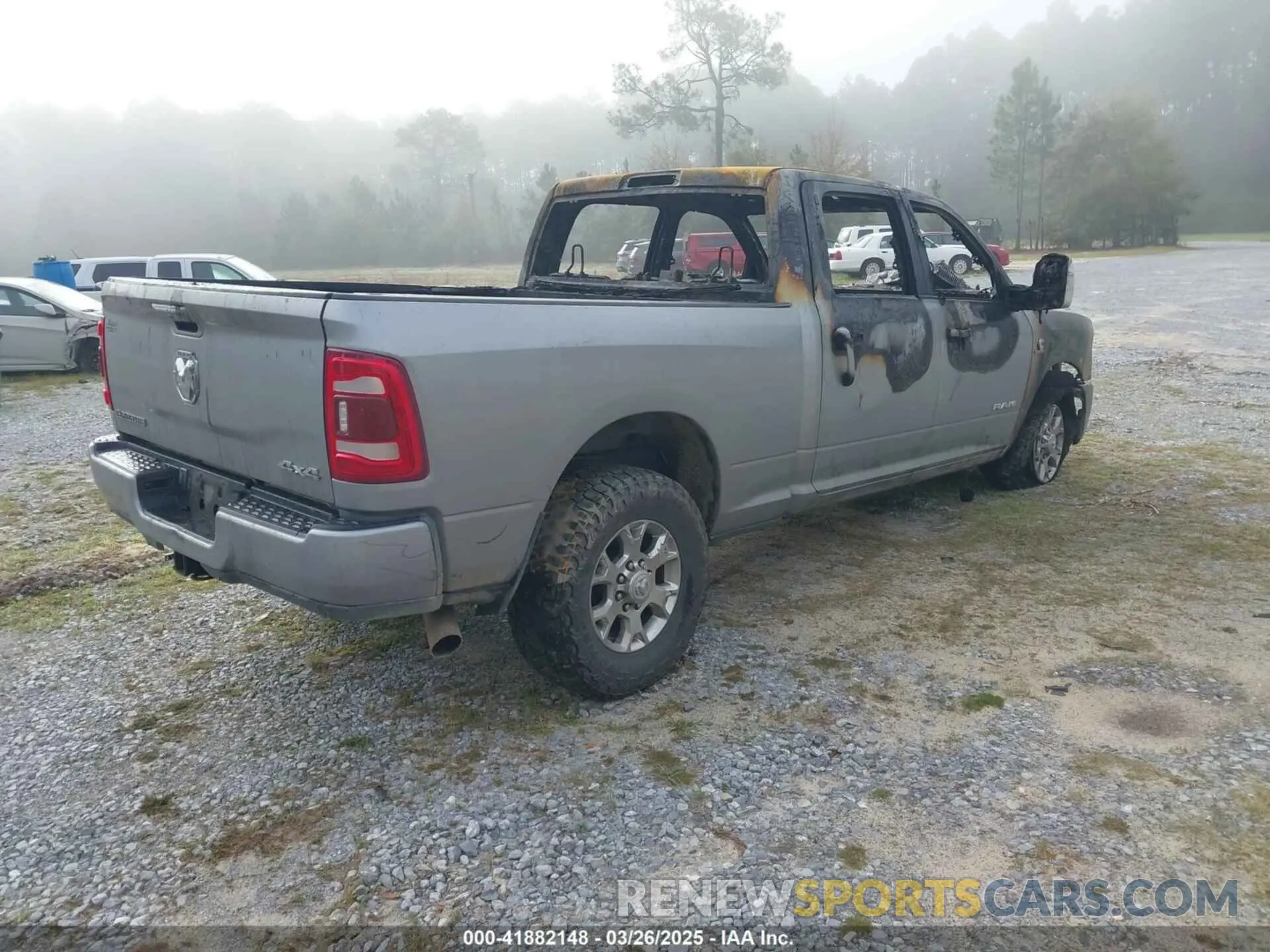 4 fotografías del automóvil dañado 3C6UR5FL7PG513099 RAM 2500 2023