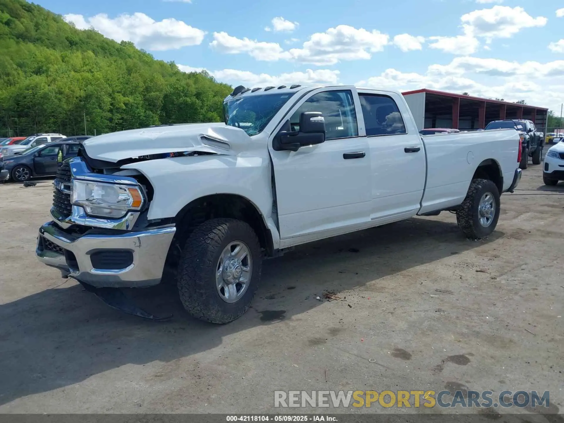 2 fotografías del automóvil dañado 3C6UR5HJ9PG564714 RAM 2500 2023