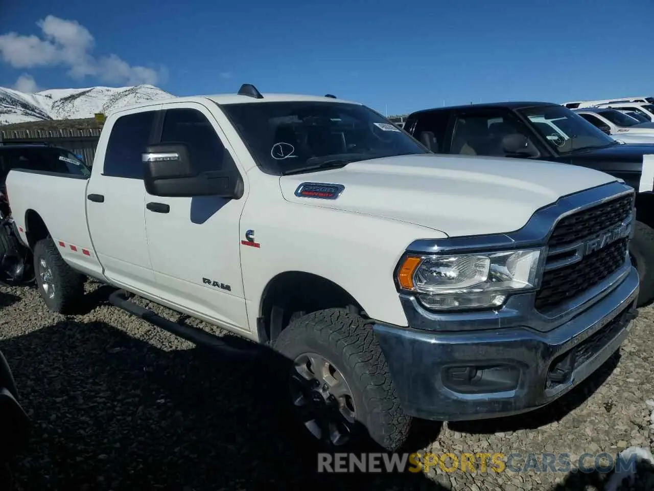 4 fotografías del automóvil dañado 3C6UR5JL3PG514404 RAM 2500 2023