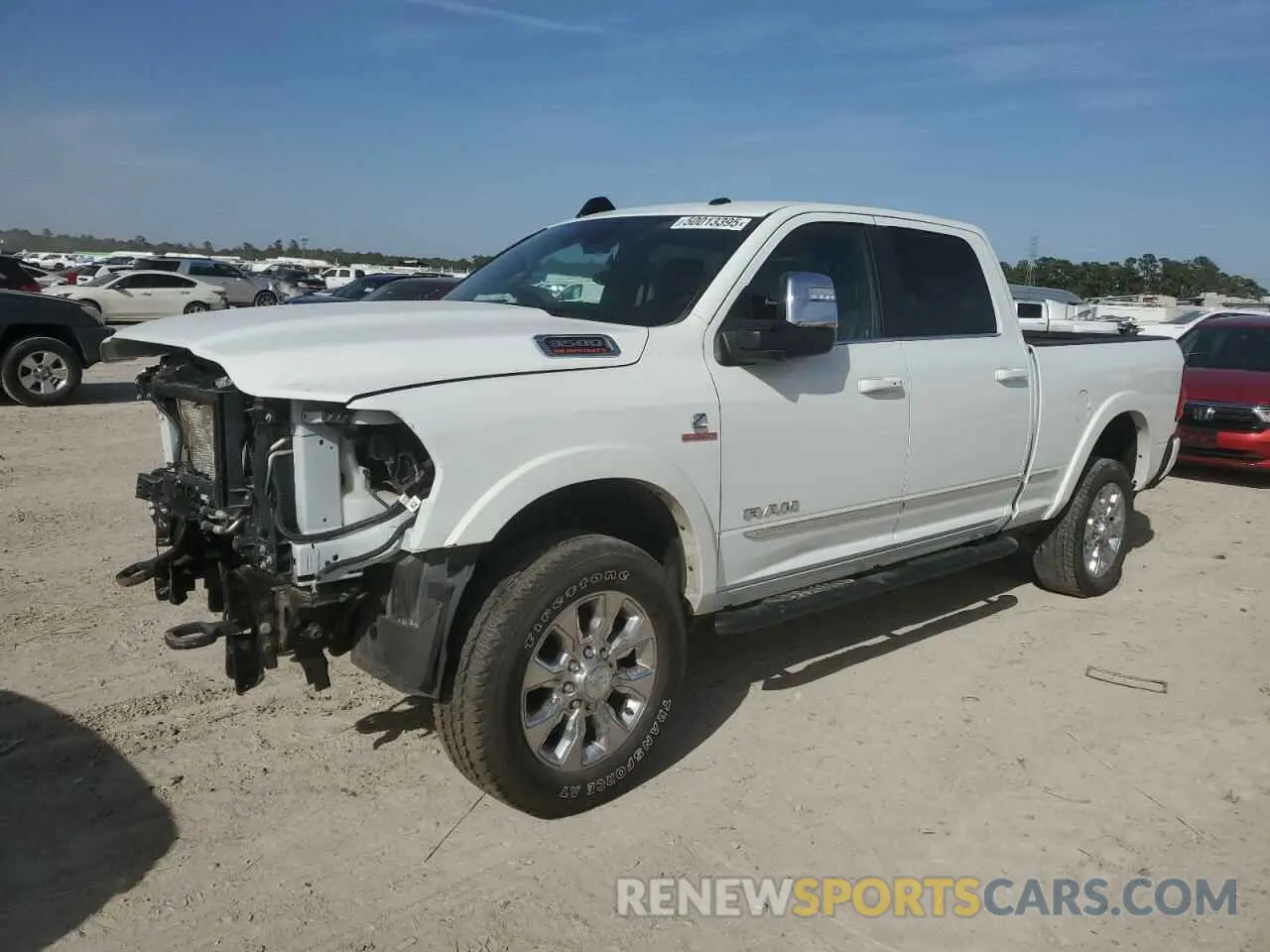 2 fotografías del automóvil dañado 3C6UR5SL4PG612906 RAM 2500 2023