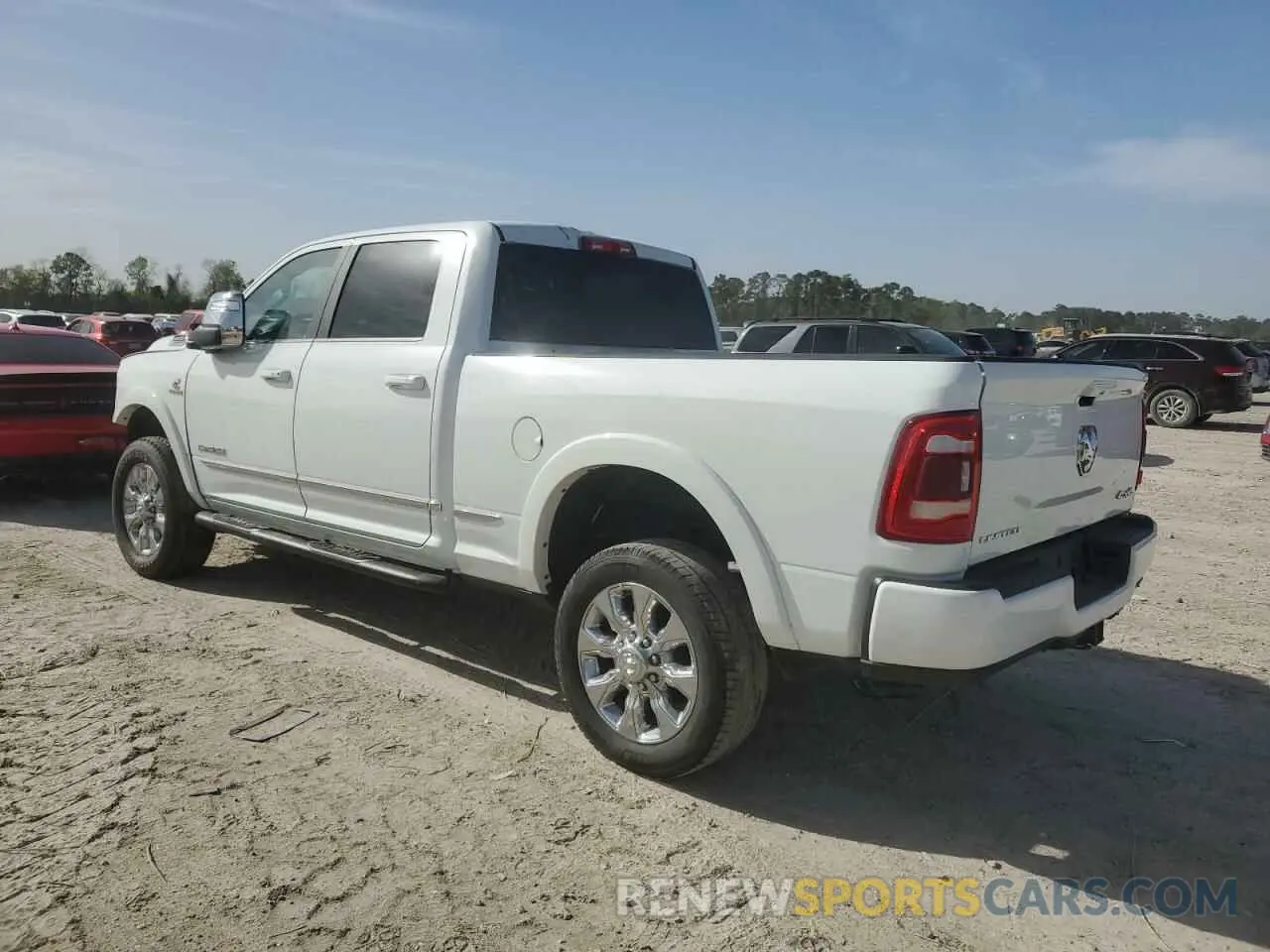 3 fotografías del automóvil dañado 3C6UR5SL4PG612906 RAM 2500 2023