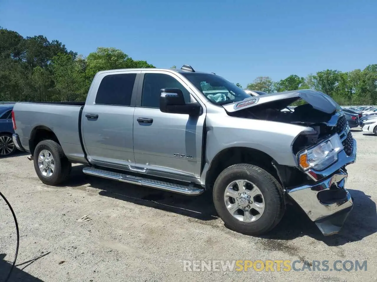 4 fotografías del automóvil dañado 3C6UR5DJ2RG354836 RAM 2500 2024