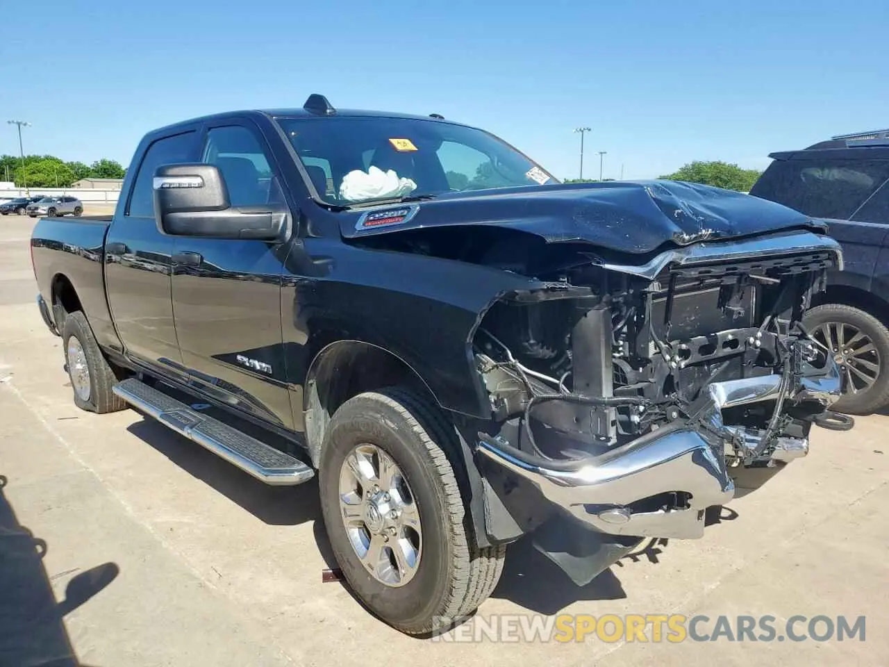 4 fotografías del automóvil dañado 3C6UR5DJ7RG322626 RAM 2500 2024