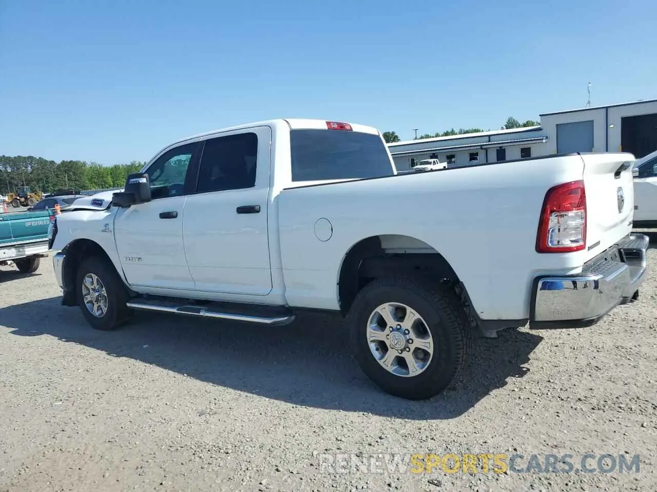 2 fotografías del automóvil dañado 3C6UR5DL0RG338202 RAM 2500 2024