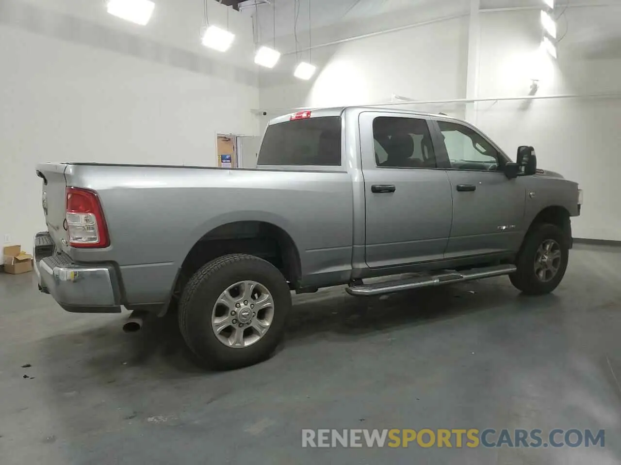 3 fotografías del automóvil dañado 3C6UR5DL2RG266547 RAM 2500 2024