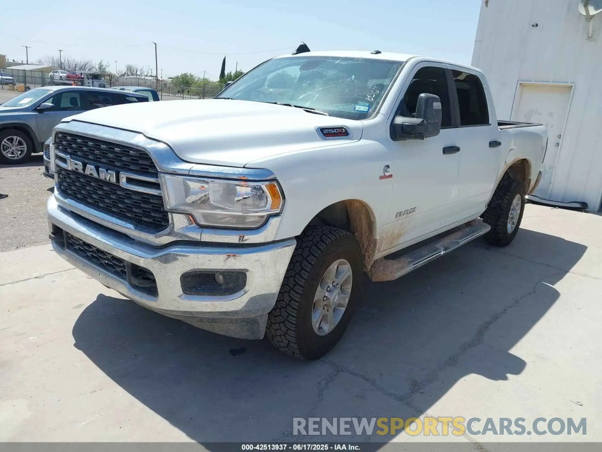 2 fotografías del automóvil dañado 3C6UR5DL2RG339979 RAM 2500 2024