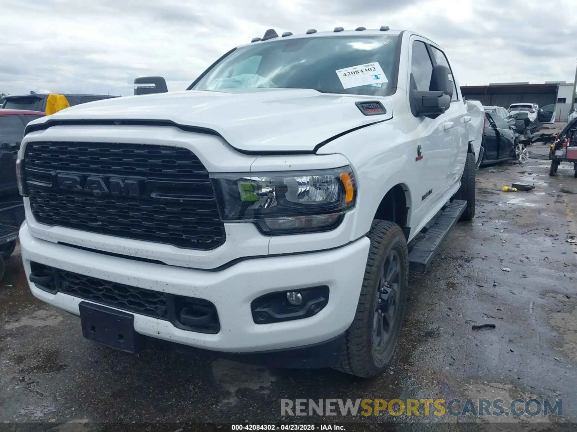 2 fotografías del automóvil dañado 3C6UR5DL2RG378362 RAM 2500 2024