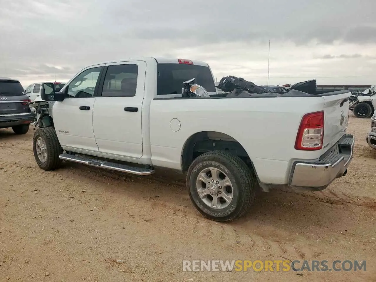 2 fotografías del automóvil dañado 3C6UR5DL5RG233994 RAM 2500 2024