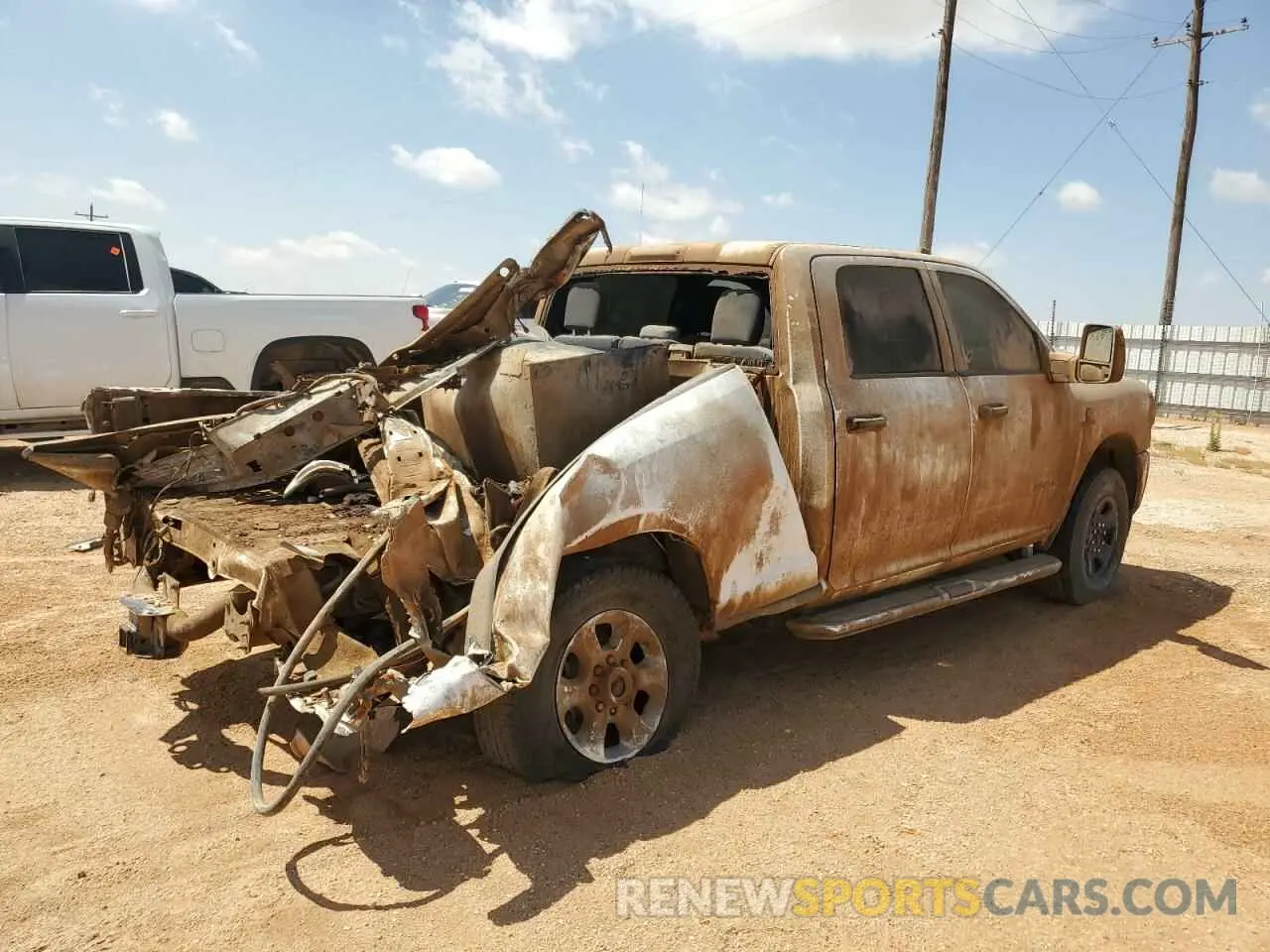 3 fotografías del automóvil dañado 3C6UR5DL6RG106266 RAM 2500 2024