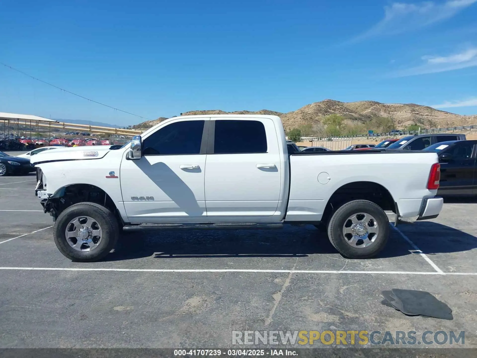 14 fotografías del automóvil dañado 3C6UR5FL2RG267971 RAM 2500 2024