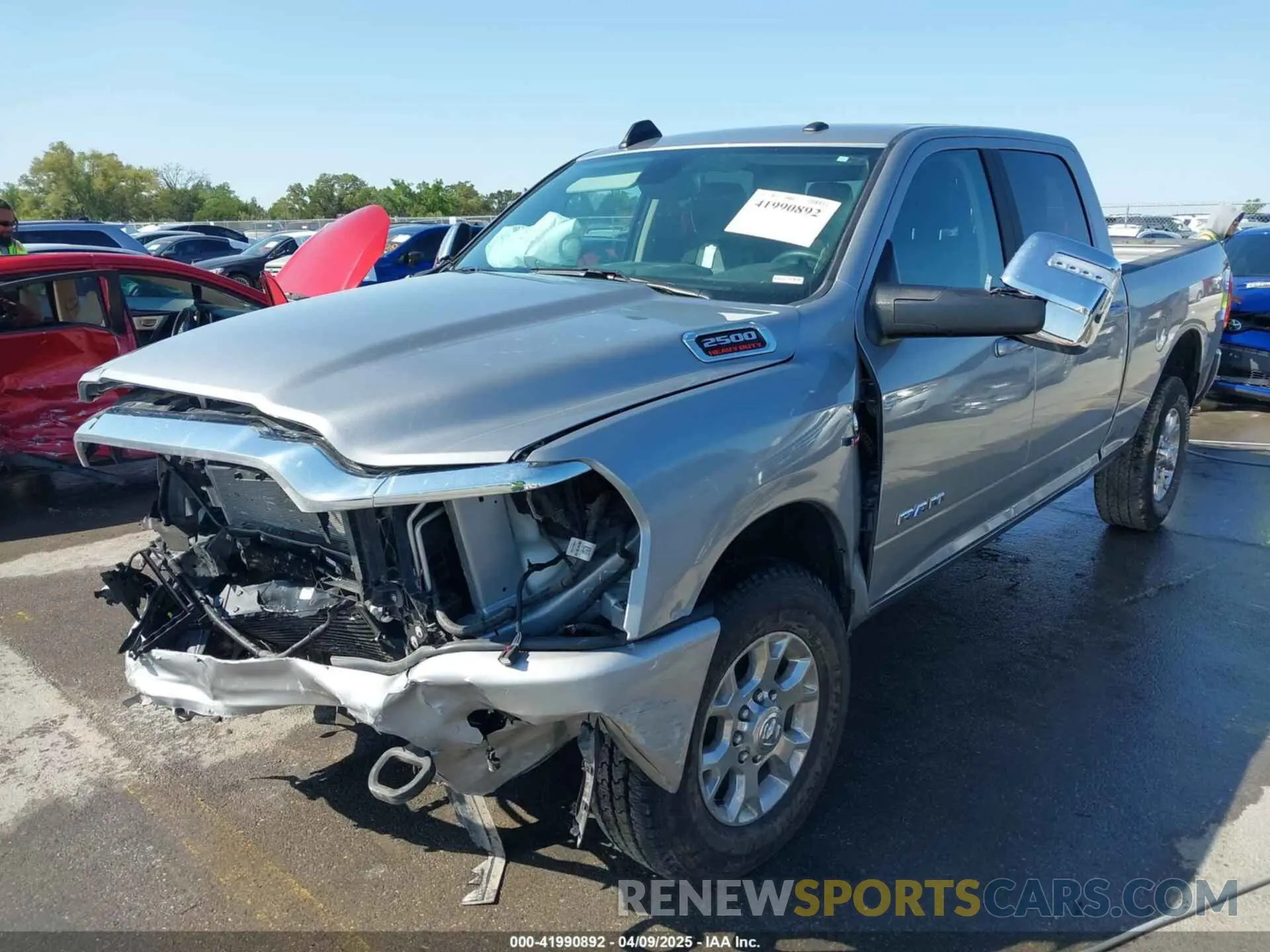 2 fotografías del automóvil dañado 3C6UR5FL4RG367117 RAM 2500 2024