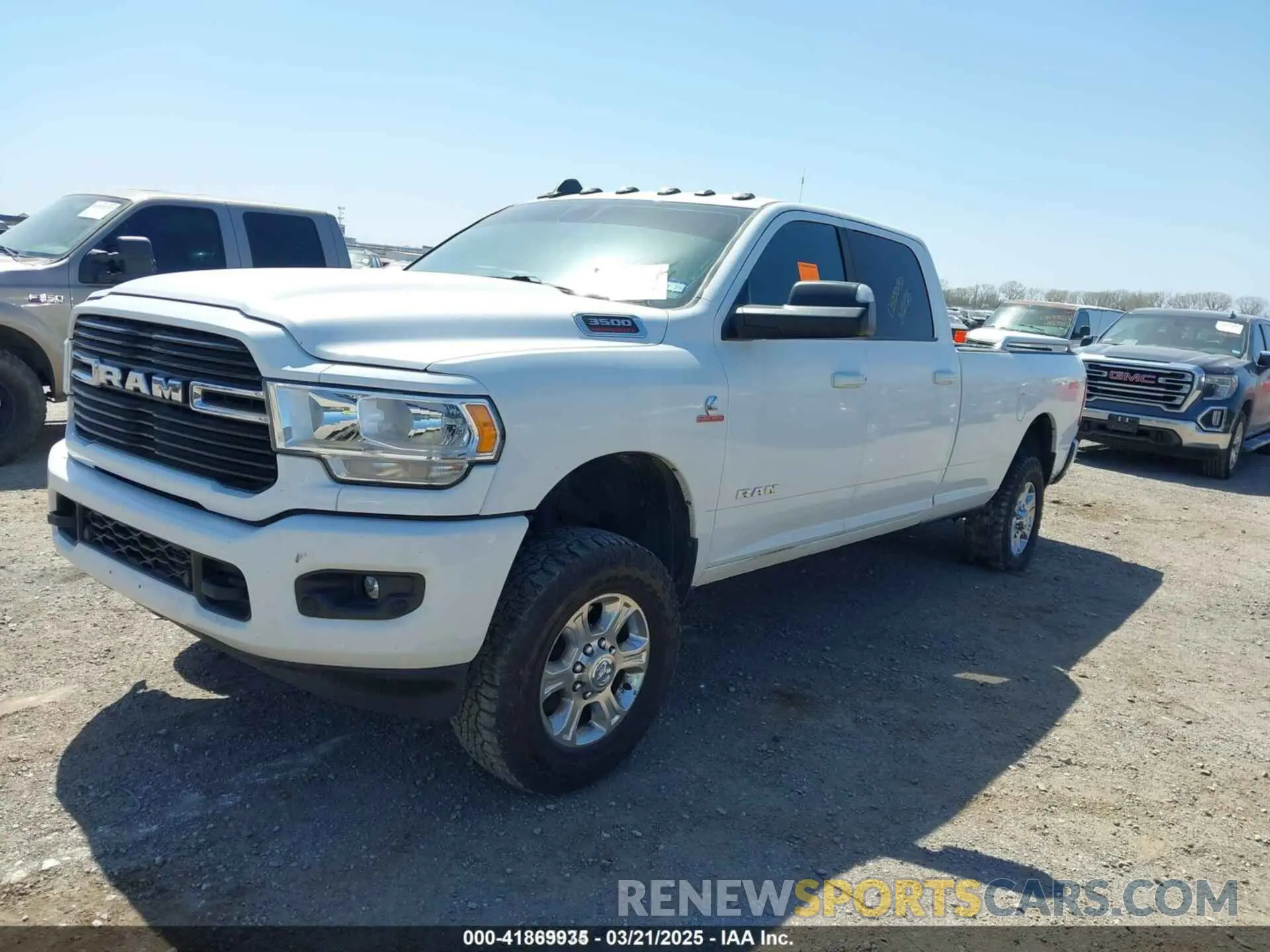 2 fotografías del automóvil dañado 3C63R3HL4KG728719 RAM 3500 2019
