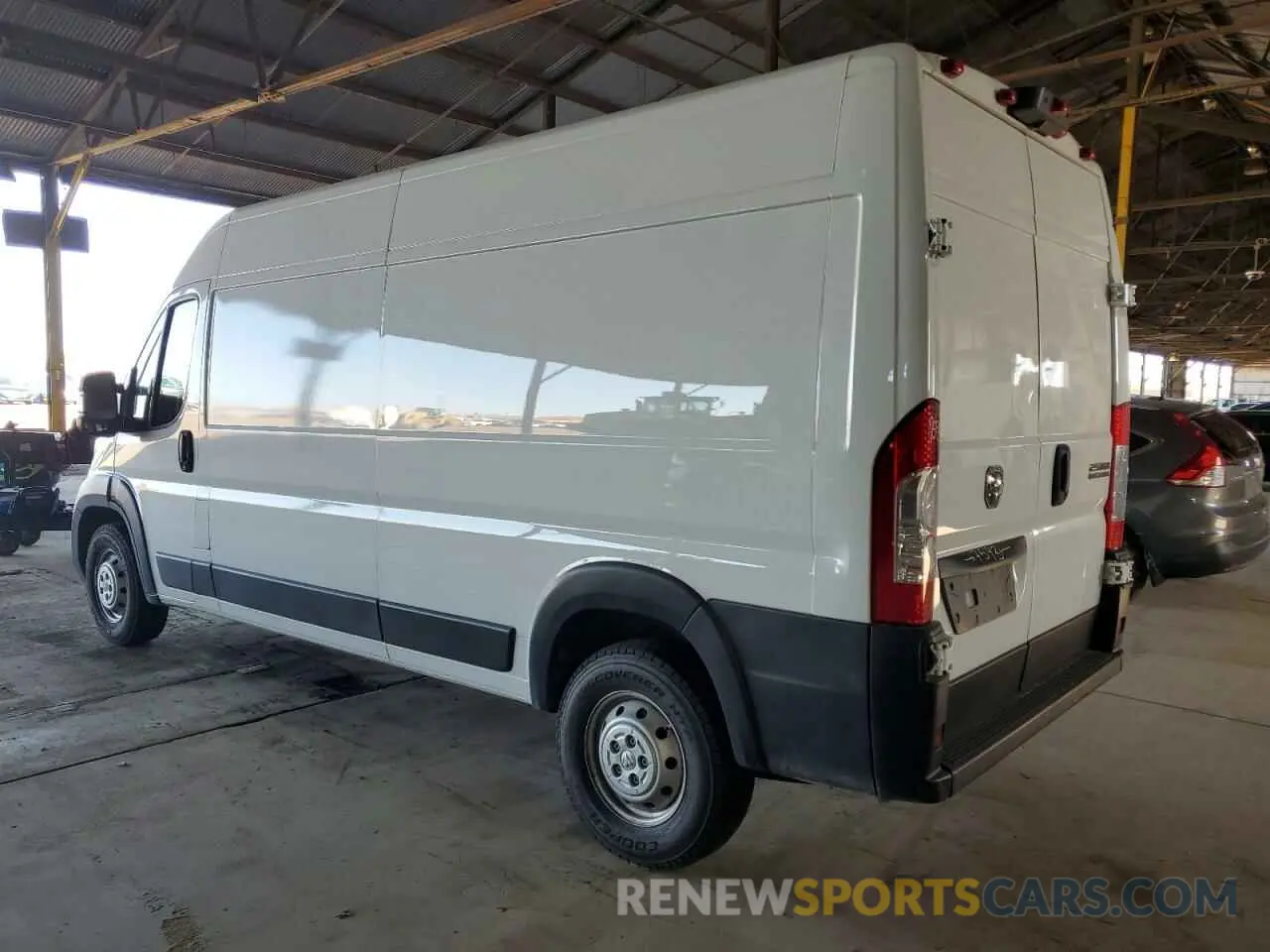 2 fotografías del automóvil dañado 3C6LRVDG6PE533597 RAM All Models 2023