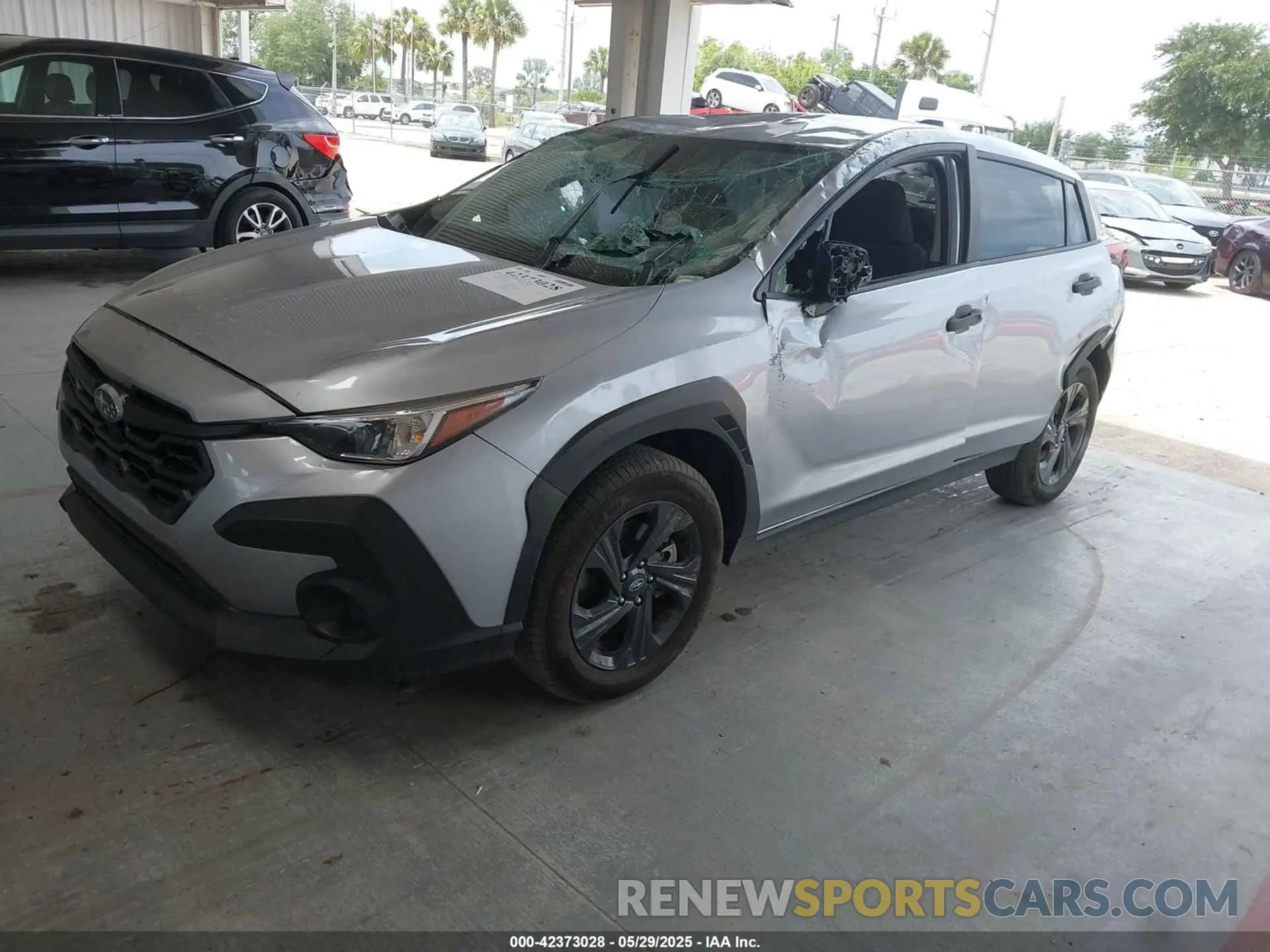 2 fotografías del automóvil dañado JF2GUABC9R8307022 SUBARU CROSSTREK 2024