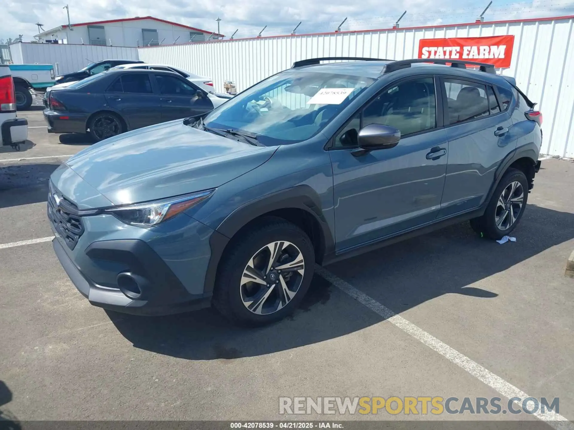 2 fotografías del automóvil dañado JF2GUADC6R8306021 SUBARU CROSSTREK 2024