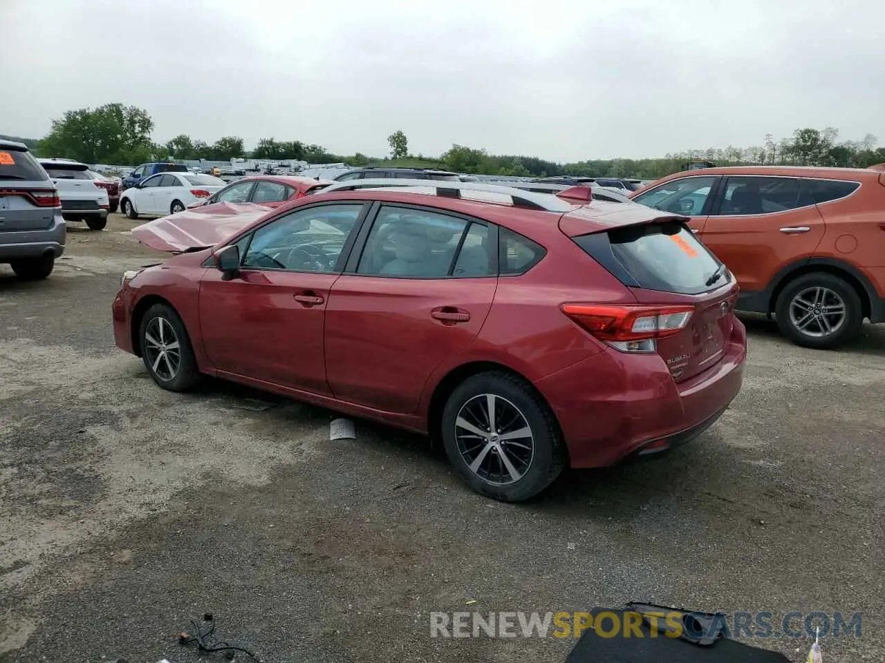 2 fotografías del automóvil dañado 4S3GTAD63K3714703 SUBARU IMPREZA 2019