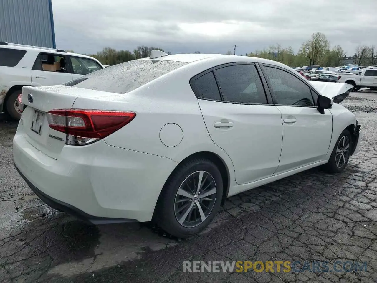 3 fotografías del automóvil dañado 4S3GKAV6XM3603781 SUBARU IMPREZA 2021