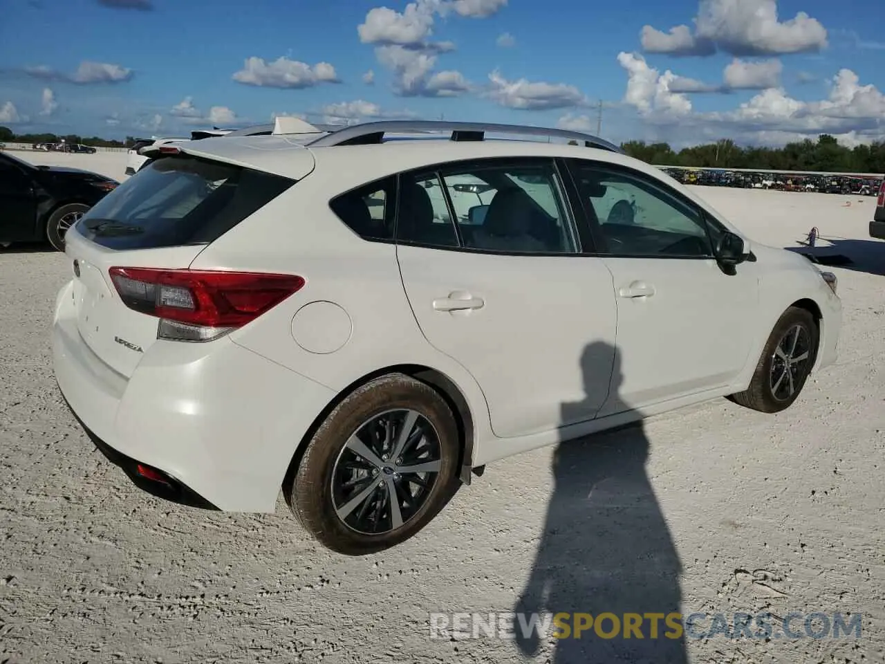 3 fotografías del automóvil dañado 4S3GTAD61N3706409 SUBARU IMPREZA 2022