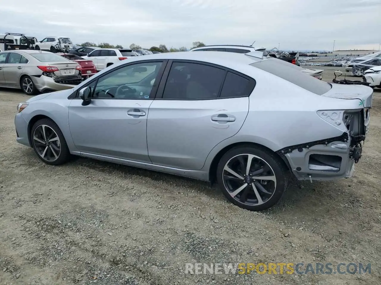 2 fotografías del automóvil dañado 4S3GKAM65P3603533 SUBARU IMPREZA 2023