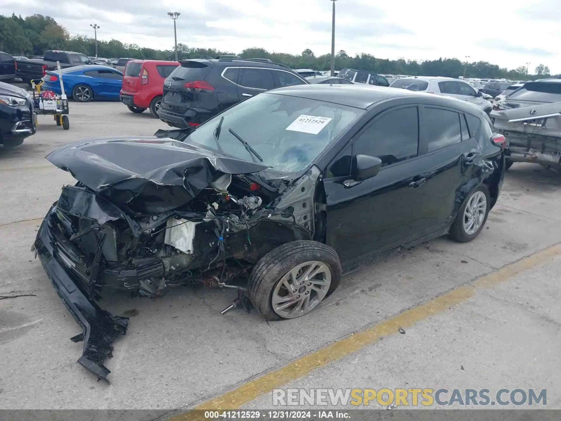 2 fotografías del automóvil dañado JF1GUABC2R8358365 SUBARU IMPREZA 2024