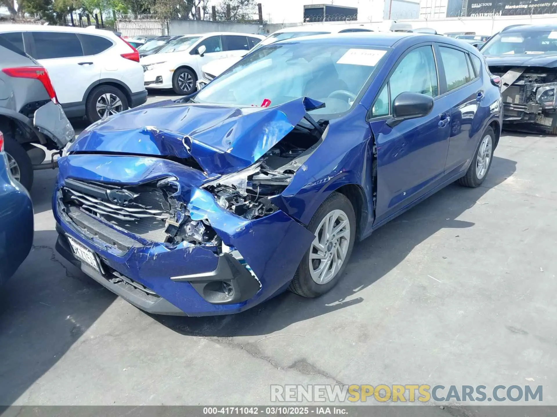 2 fotografías del automóvil dañado JF1GUABC9R8323581 SUBARU IMPREZA 2024