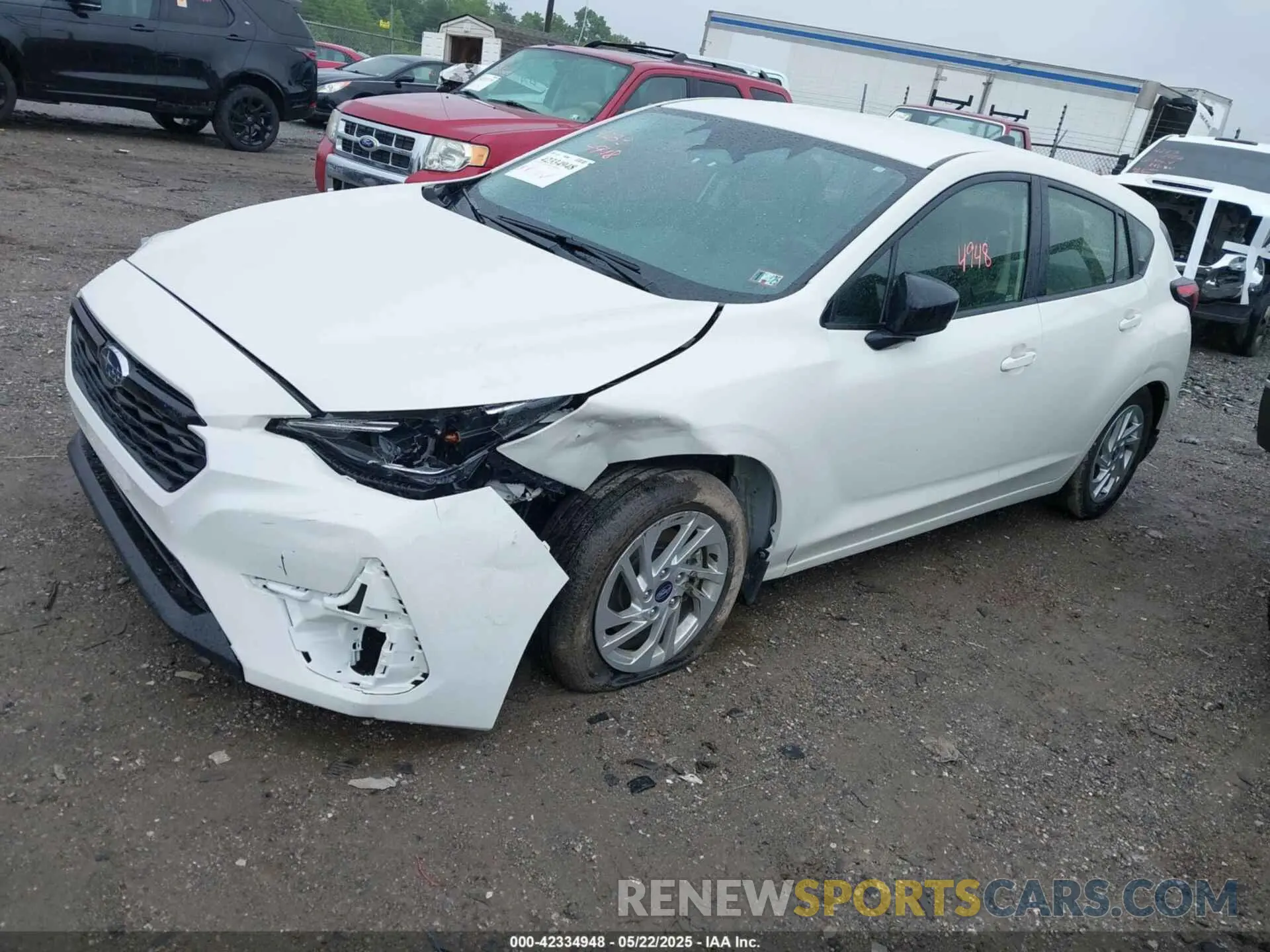 2 fotografías del automóvil dañado JF1GUABCXR8324402 SUBARU IMPREZA 2024