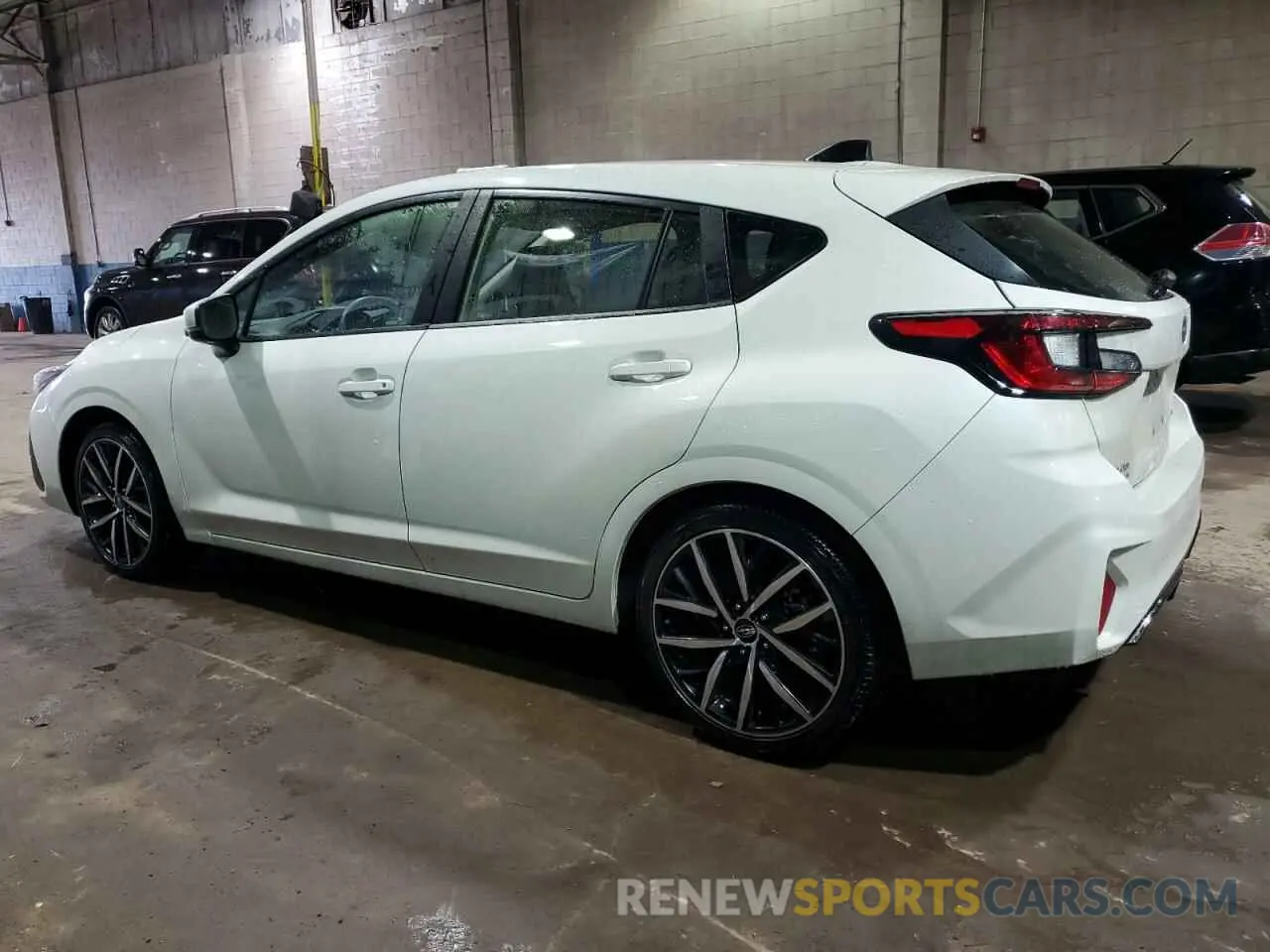 2 fotografías del automóvil dañado JF1GUAFC3R8240786 SUBARU IMPREZA 2024