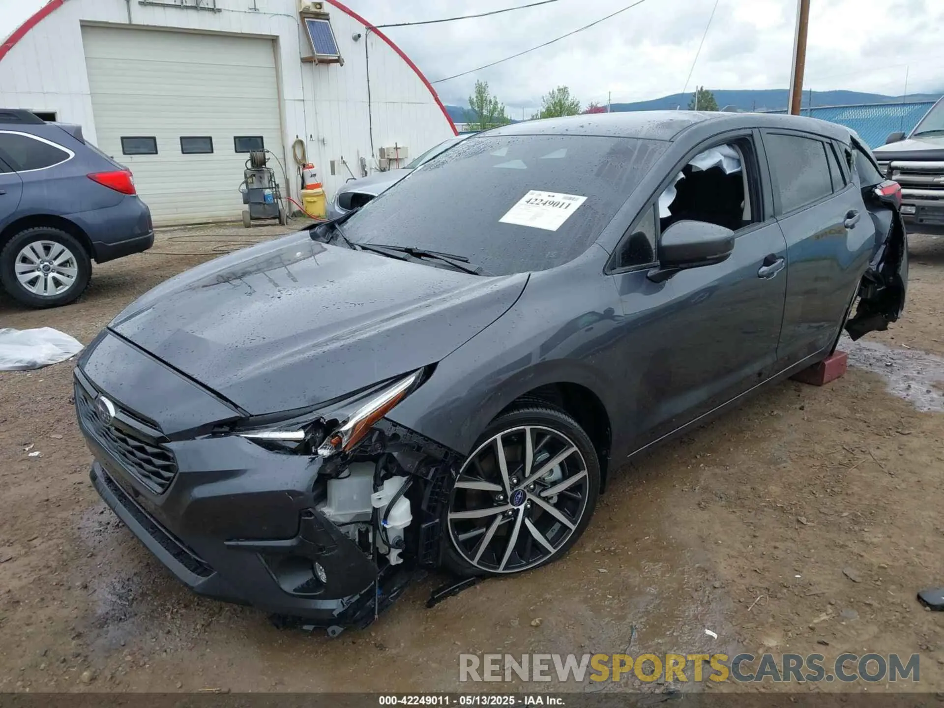 2 fotografías del automóvil dañado JF1GUAFC6R8890079 SUBARU IMPREZA 2024