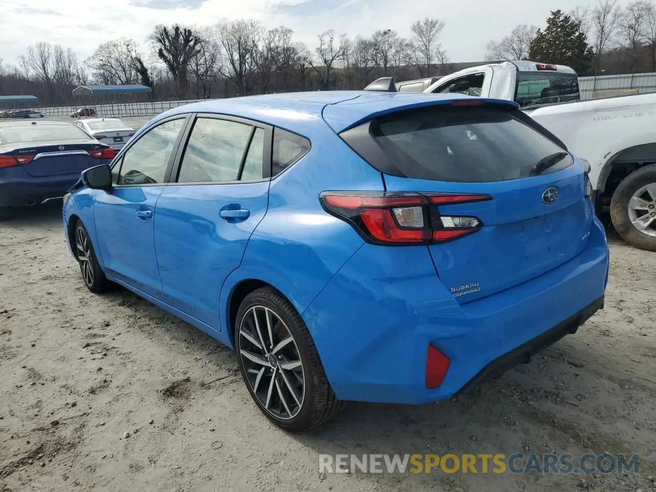 2 fotografías del automóvil dañado JF1GUAFC7R8306451 SUBARU IMPREZA 2024