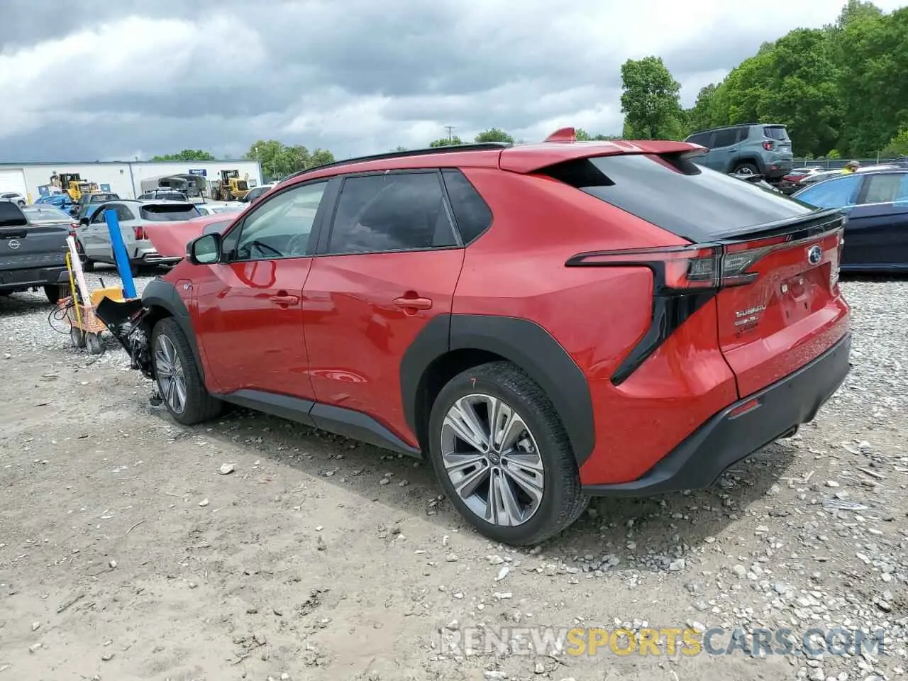 2 fotografías del automóvil dañado JTMABABA4PA002381 SUBARU SOLTERRA P 2023